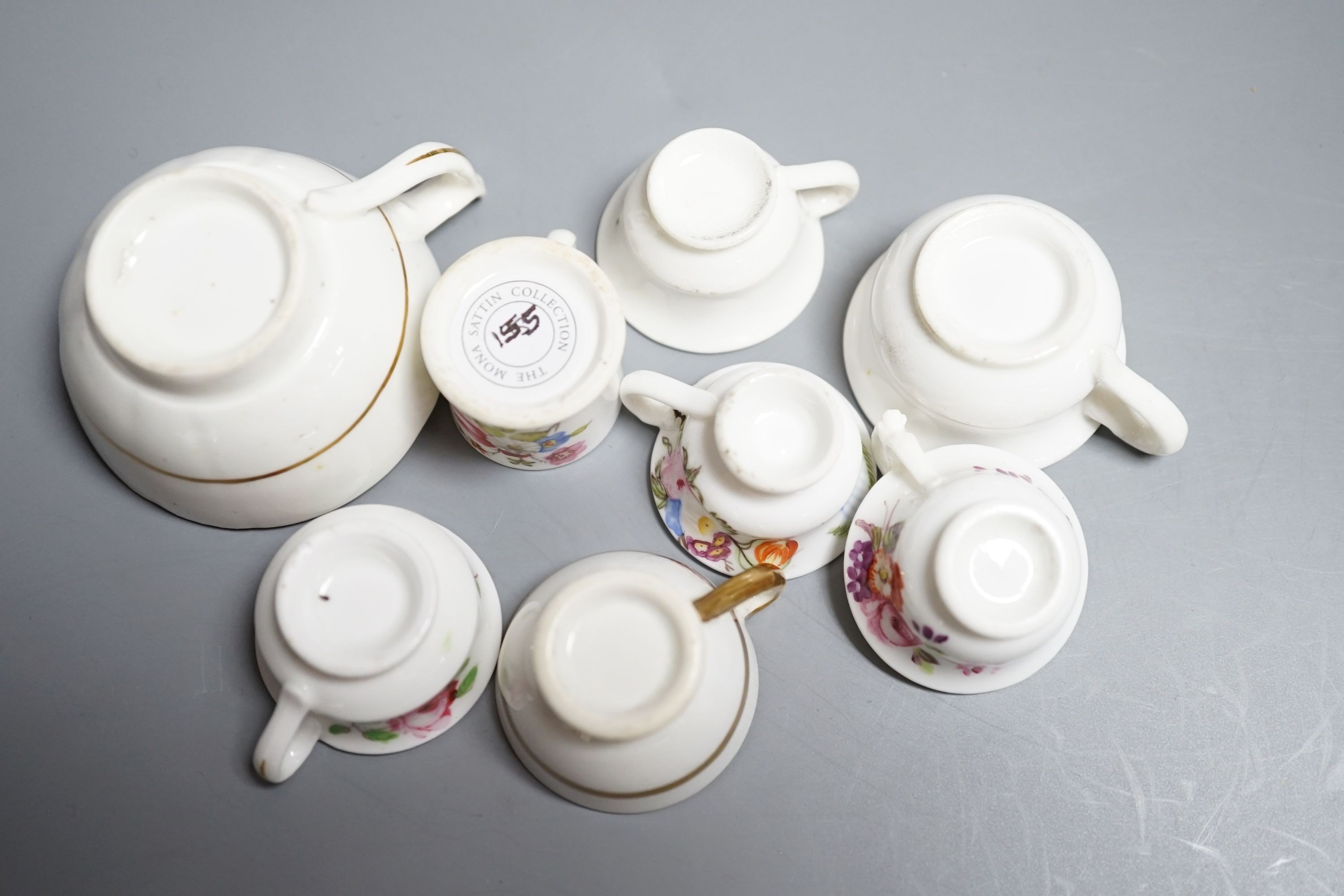 Seven Staffordshire or Alcock miniature teacups and saucers and a similar miniature mug, c.1815-20. Provenance - Mona Sattin collection of miniature cups and saucers, collection no.s 144, 148, 151, 152, 155, 161-163